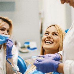 patient talking to dental team 