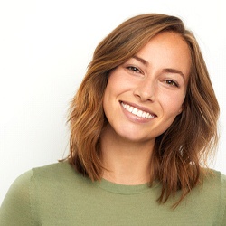 Smiling woman in a green shirt