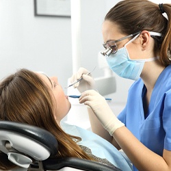 Woman getting a dental cleaning