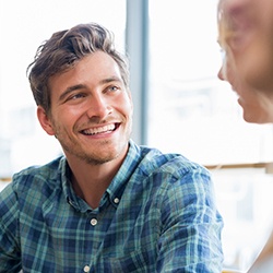 Man with cosmetic dentistry in Louisville smiling