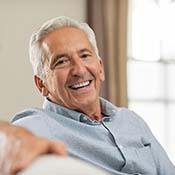 senior man relaxing on a couch 