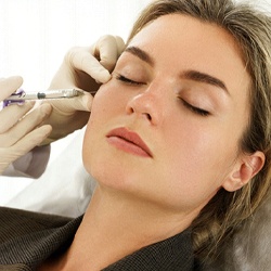 Woman receiving dermal fillers in Louisville