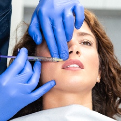 Woman receiving dermal fillers in Louisville