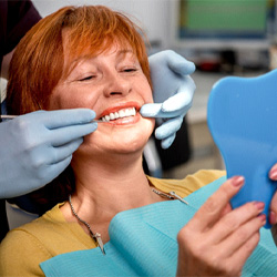 a patient receiving dental implant care in Louisville