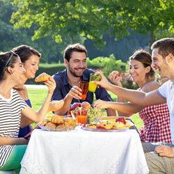 Friends eating outdoors