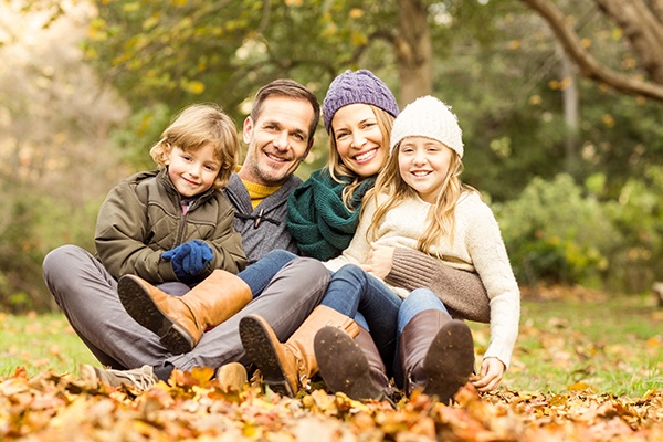 Smiling family outdoors