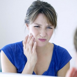 woman with mouth pain