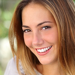 woman smiling outside