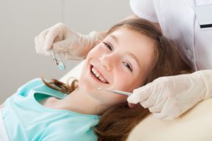 young girl at dentist