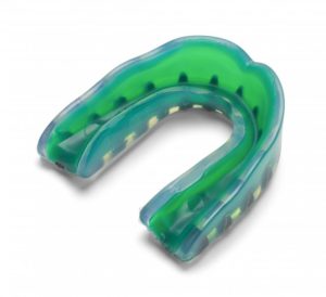 green custom mouthguard made by preventive dentist