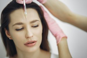 Woman receiving BOTOX injection