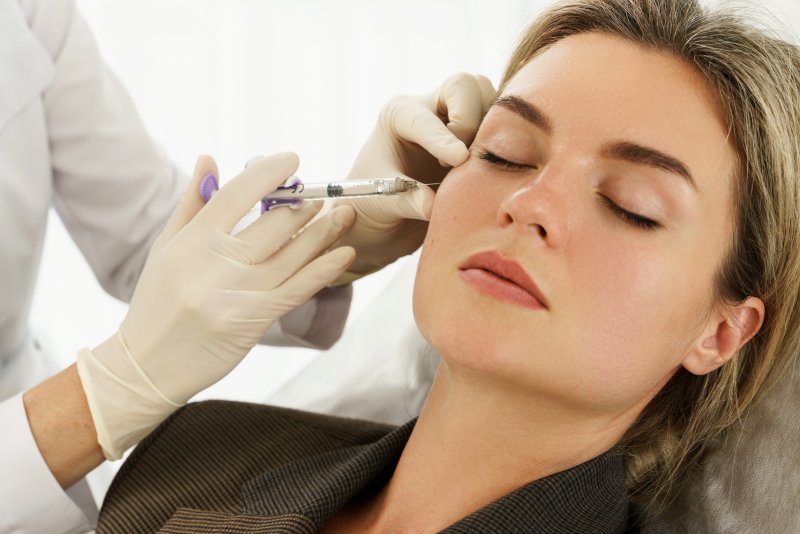 woman receiving dermal fillers