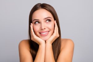 a patient smiling after receiving BOTOX treatment