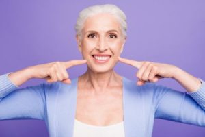 a patient smiling after receiving BOTOX