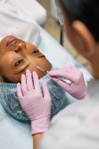 Woman receiving dermal filler