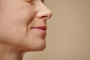 a closeup of a woman with laugh lines