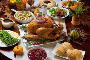 Table filled with Thanksgiving foods